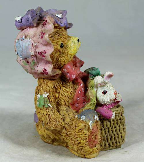 Bear with a rabbit in a basket