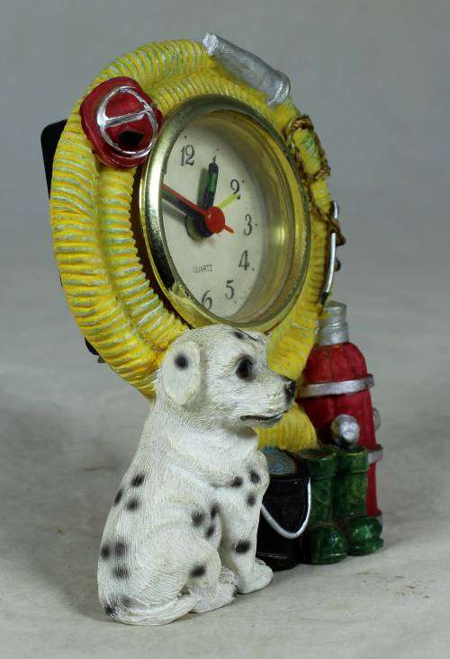 FIREMANS PUPPY CLOCK (WOW AND IT STILL WORKS)-BID NOW!!