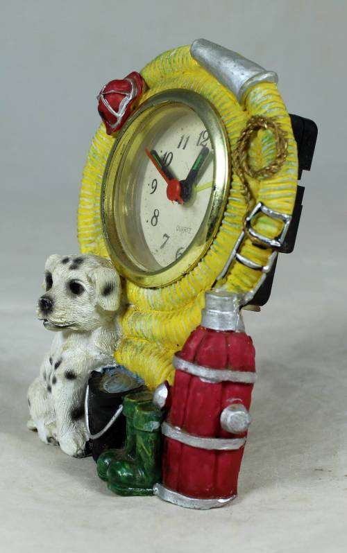 FIREMANS PUPPY CLOCK (WOW AND IT STILL WORKS)-BID NOW!!