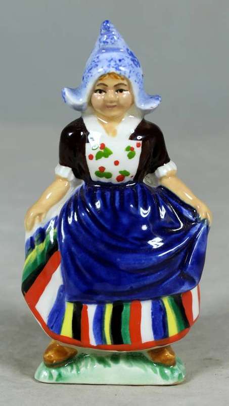 Vintage porcelain figurine - woman in traditional clothes #54