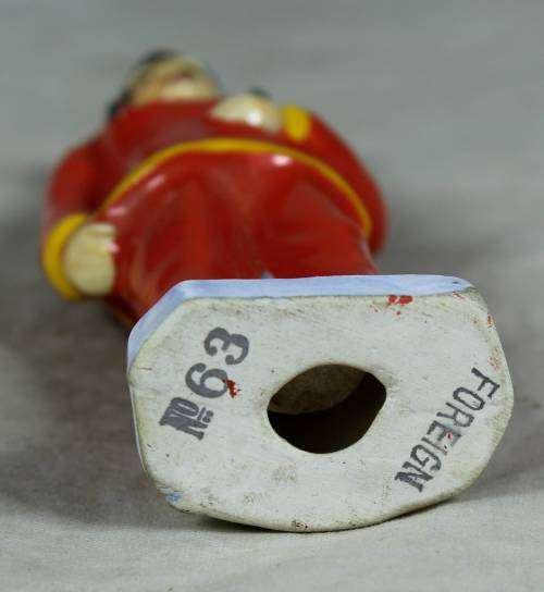 VINTAGE PORCELAIN FIGURINE (MARKED FOREIGN)-MAN DRESSED IN TRADITIONAL CLOTHES #63