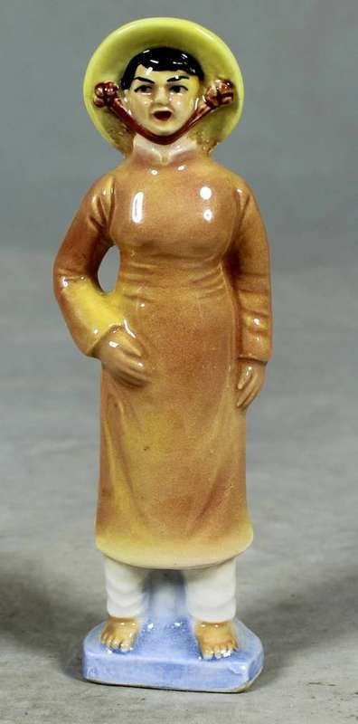 VINTAGE PORCELAIN FIGURINE (MARKED FOREIGN)-WOMAN DRESSED IN TRADITIONAL CLOTHES #67