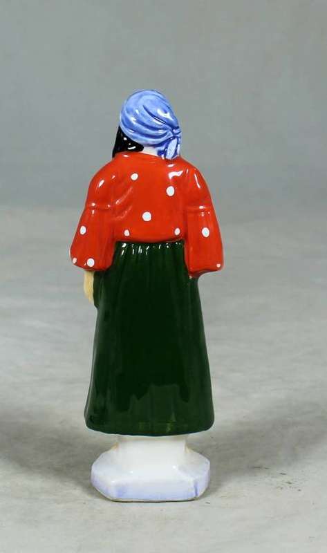 VINTAGE PORCELAIN FIGURINE (MARKED FOREIGN)-WOMAN DRESSED IN TRADITIONAL CLOTHES #68