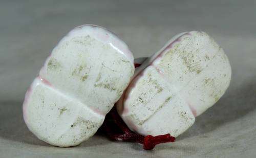 miniature pair of porcelain baby shoes