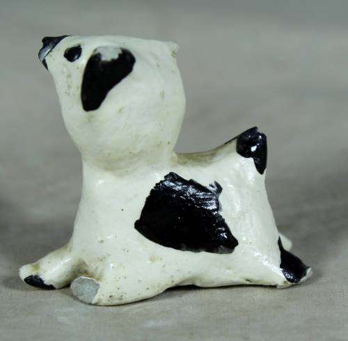 Miniature ceramic dog