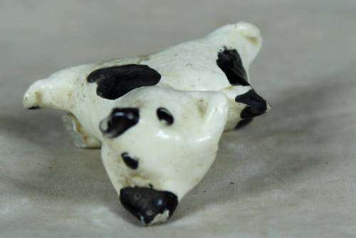 Miniature ceramic dog