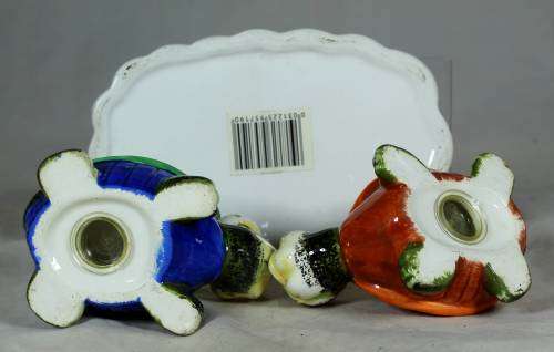 Set of tortoise salt and pepper shakers on a stand