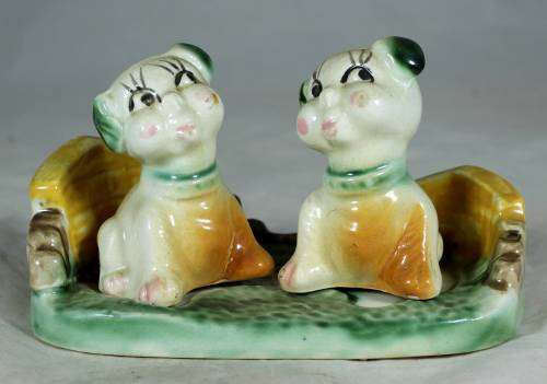 Pair of dogs on a stand - salt and pepper shakers