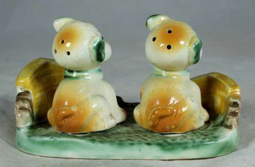 Pair of dogs on a stand - salt and pepper shakers