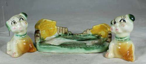 Pair of dogs on a stand - salt and pepper shakers