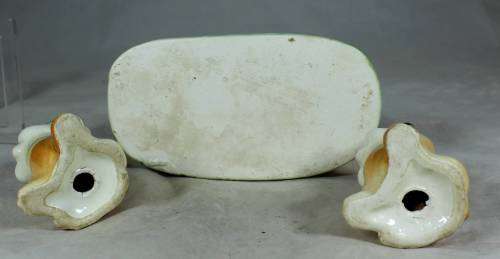 Pair of dogs on a stand - salt and pepper shakers