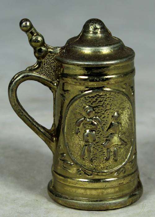 Miniature brass German beer stein