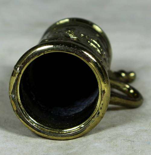 Miniature brass German beer stein