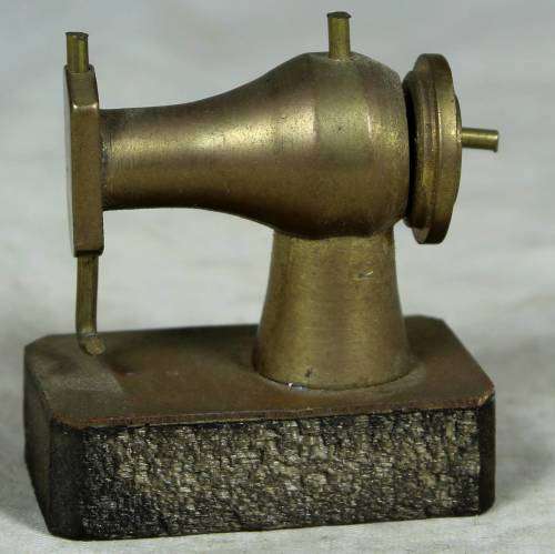 Miniature brass sewing machine