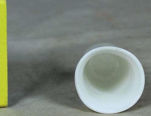 Porcelain thimble - bridge covered by trees