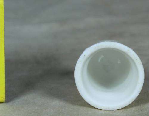 Porcelain thimble with purple flowers