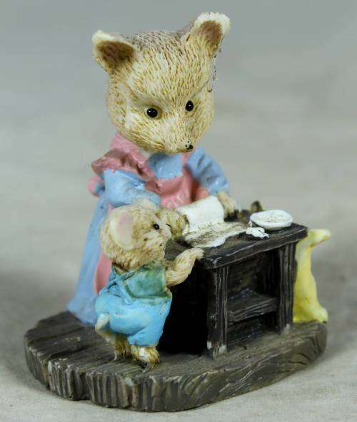 Miniature mama bear and baby bear baking
