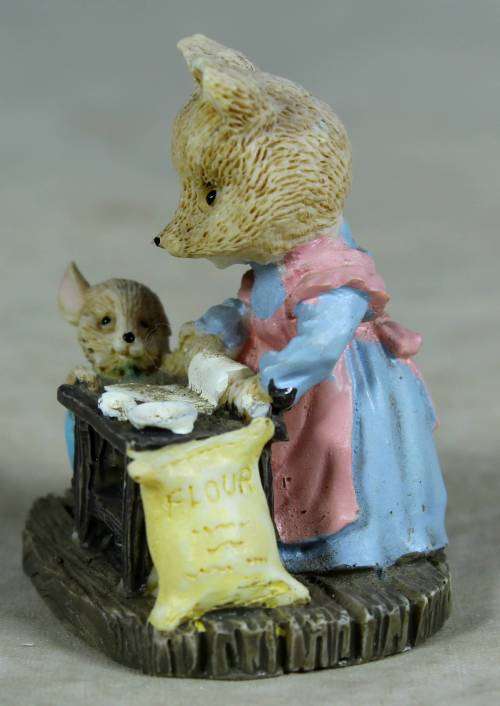 Miniature mama bear and baby bear baking