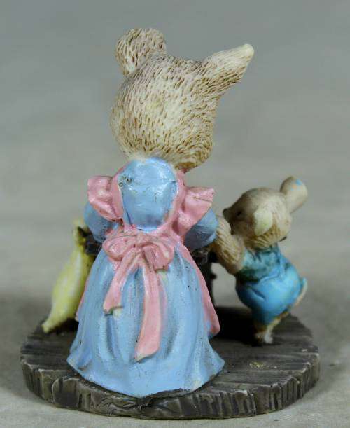 Miniature mama bear and baby bear baking