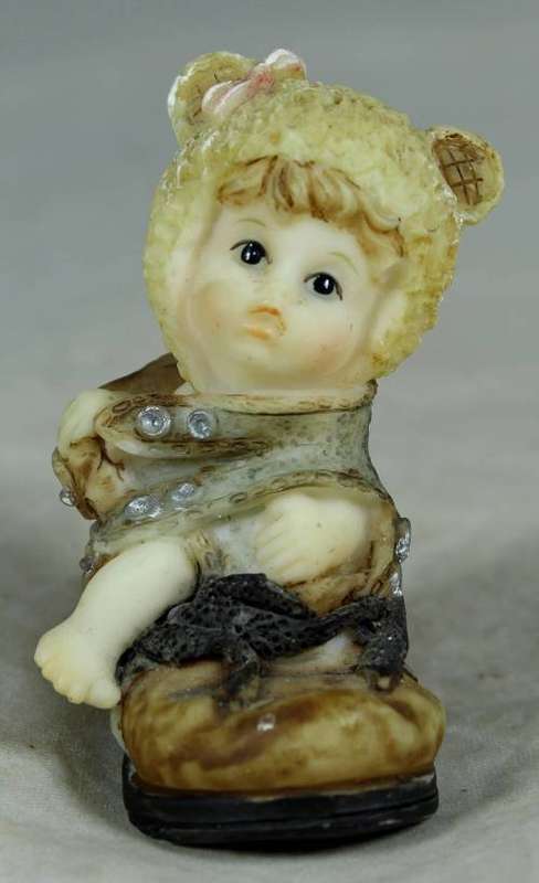 Miniature baby in a shoe