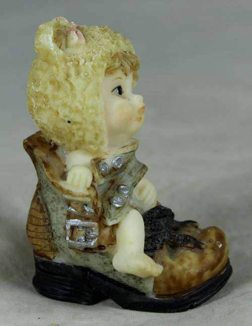 Miniature baby in a shoe