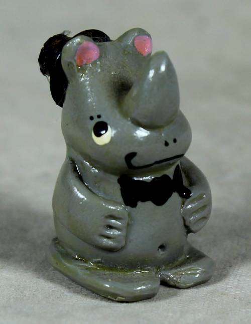MINIATURE-HAND PAINTED RHINO WITH A TOP HAT BY CHARMAINE-BID NOW!