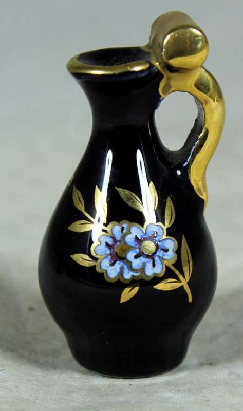 Miniature  gold and blue pitcher