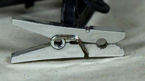 Miniature silver colored letter peg