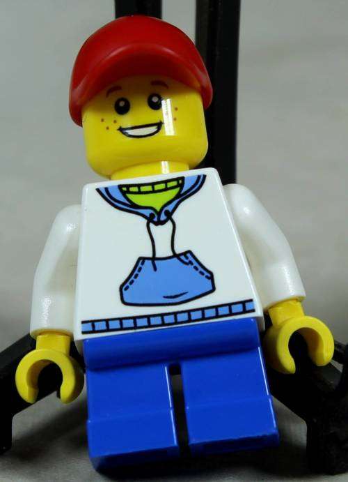 MINIATURE LEGO FIGURINE-BOY IN A SWEATSHIRT BID NOW!!
