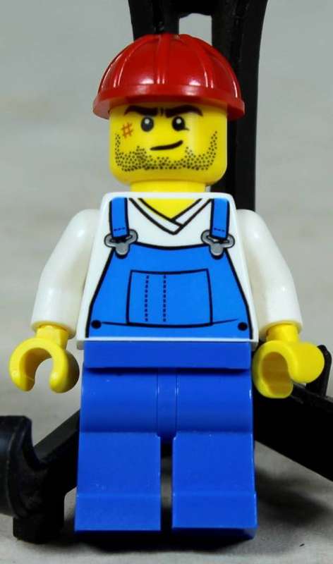 Miniature Lego figurine - Construction worker in blue overalls