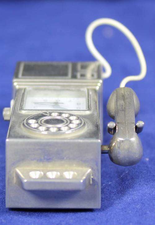 Hachette clock with booklet - Nostalgic payphone
