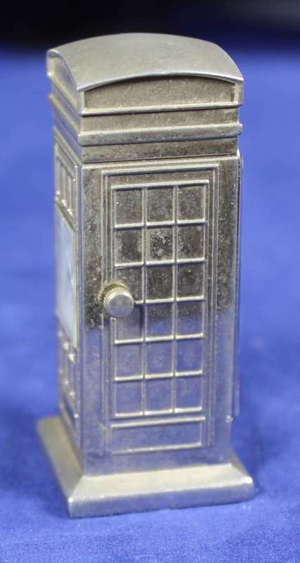 Hachette clock with booklet - British phone box