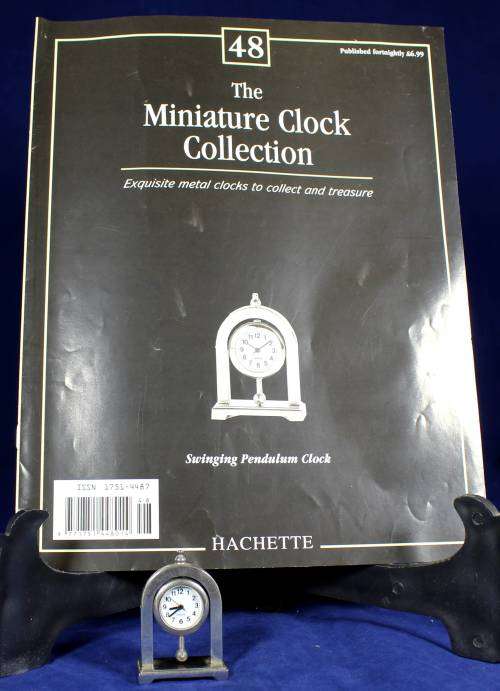 Hachette clock with booklet - Swinging pendulum