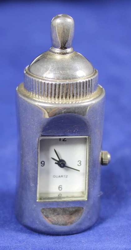 Hachette clock with booklet - Babies bottle
