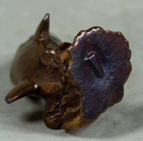 Miniature brass color lead dolphin