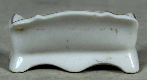 Miniature porcelain couch