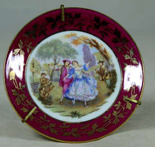 Small Limoges display plate on a stand