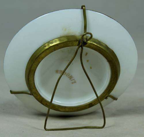 Small Limoges display plate on a stand