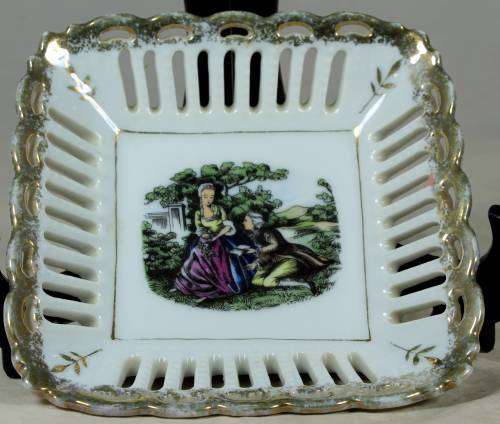 Small squire porcelain tray with a Victorian couple
