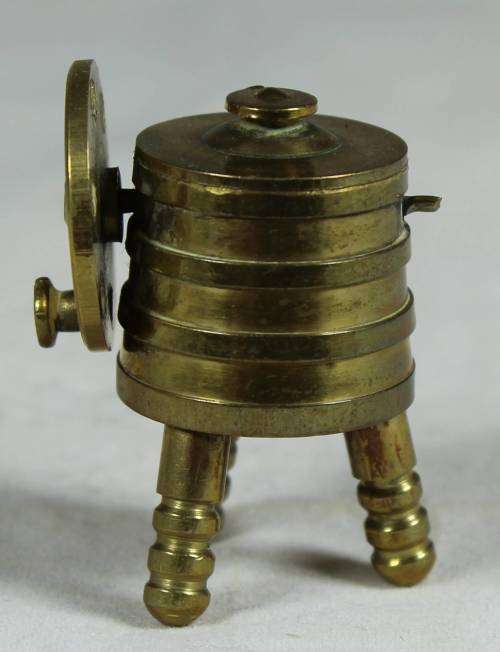 Miniature brass washing machine