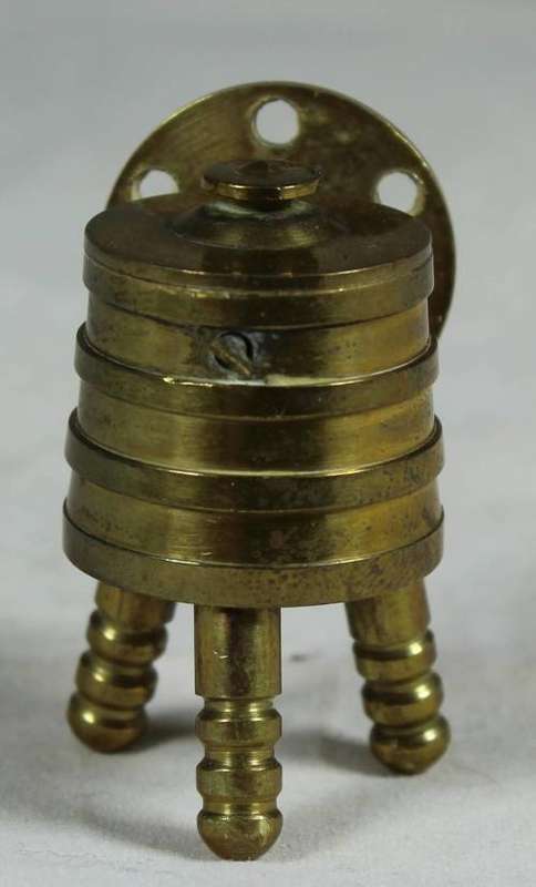 Miniature brass washing machine