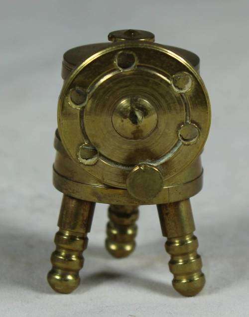 Miniature brass washing machine