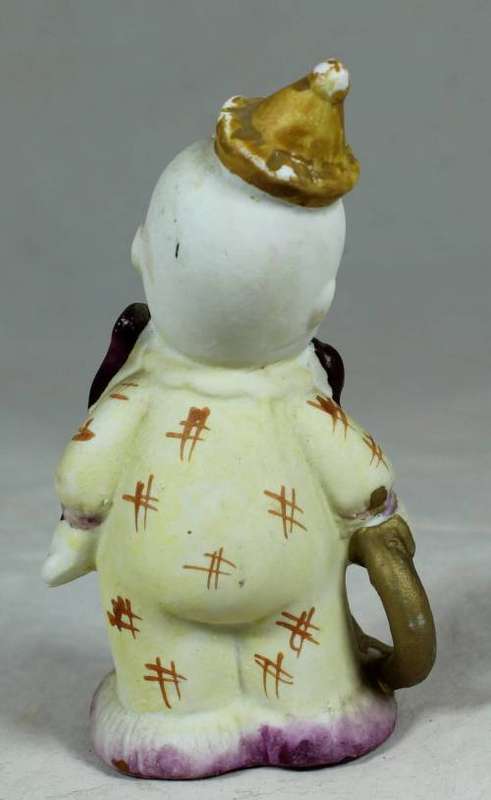 Smiling clown with a gold ring