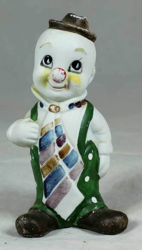Smiling clown with a large tie