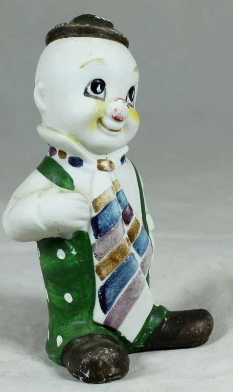 Smiling clown with a large tie