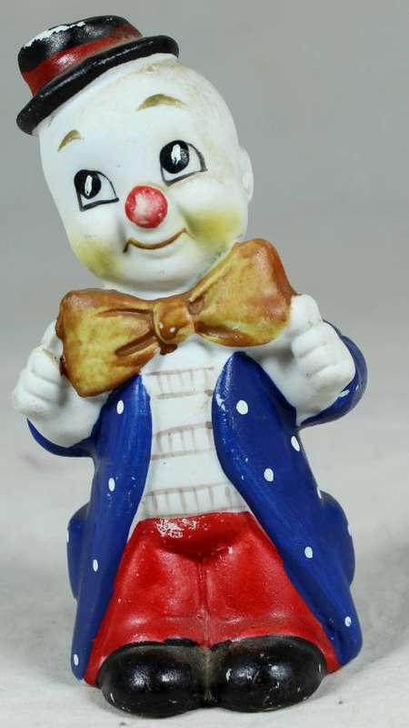Small figurine - smiling clown with a large bow tie