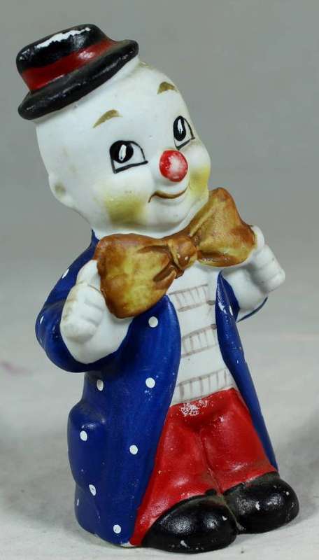 Small figurine - smiling clown with a large bow tie