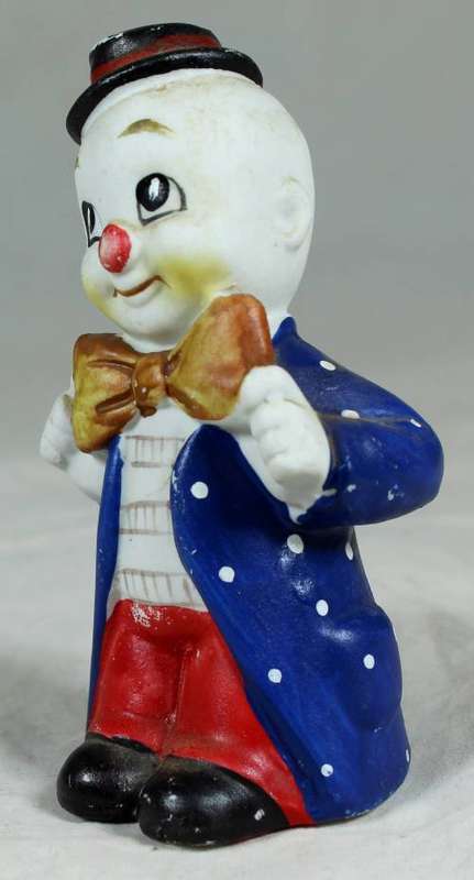Small figurine - smiling clown with a large bow tie