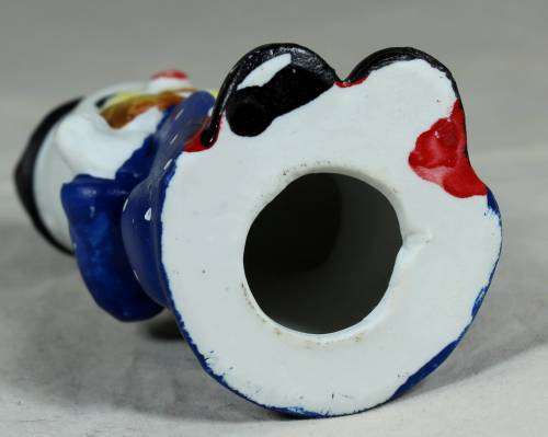Small figurine - smiling clown with a large bow tie