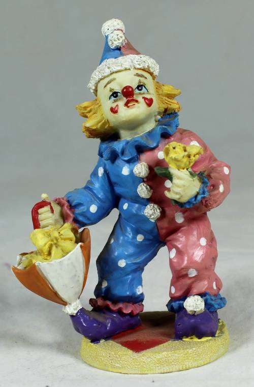 Clown with flowers and umbrella